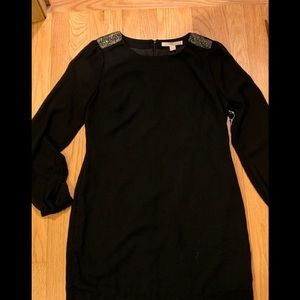 Black dress with shoulder detail